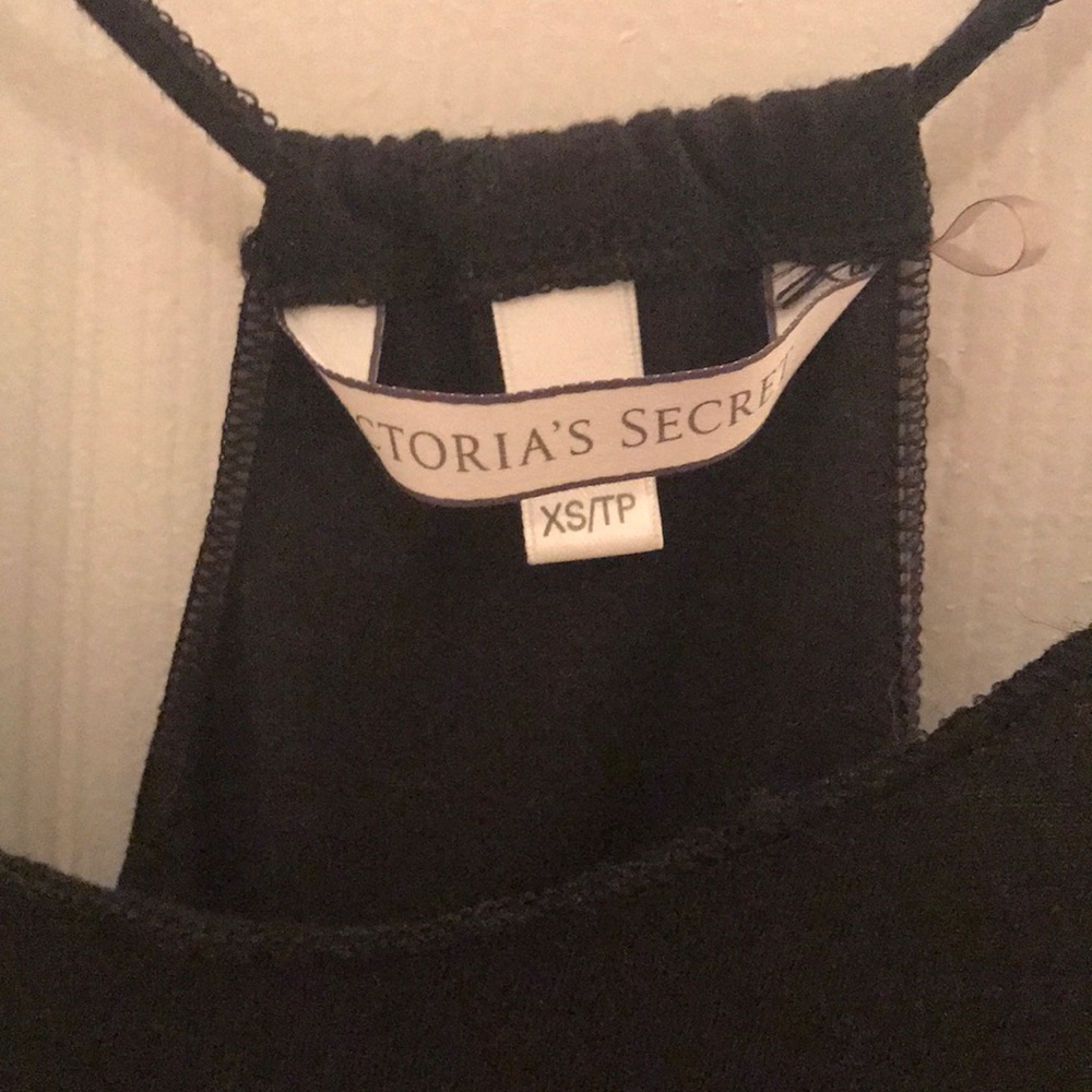 Slightly worn black Victoria secret shirt