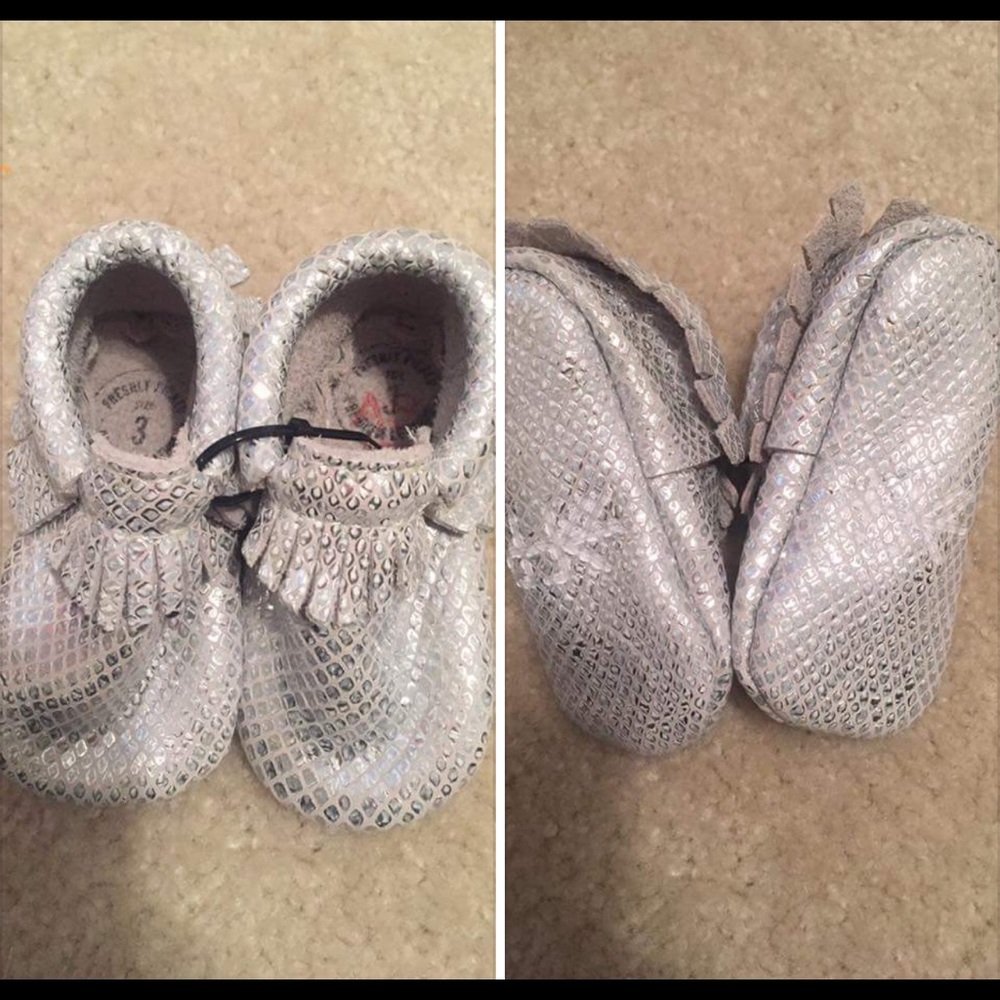 New silver moccasins