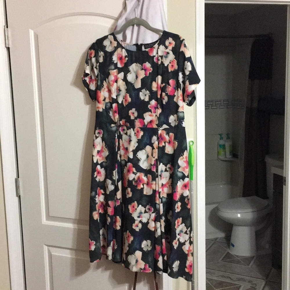 Knee length dress.