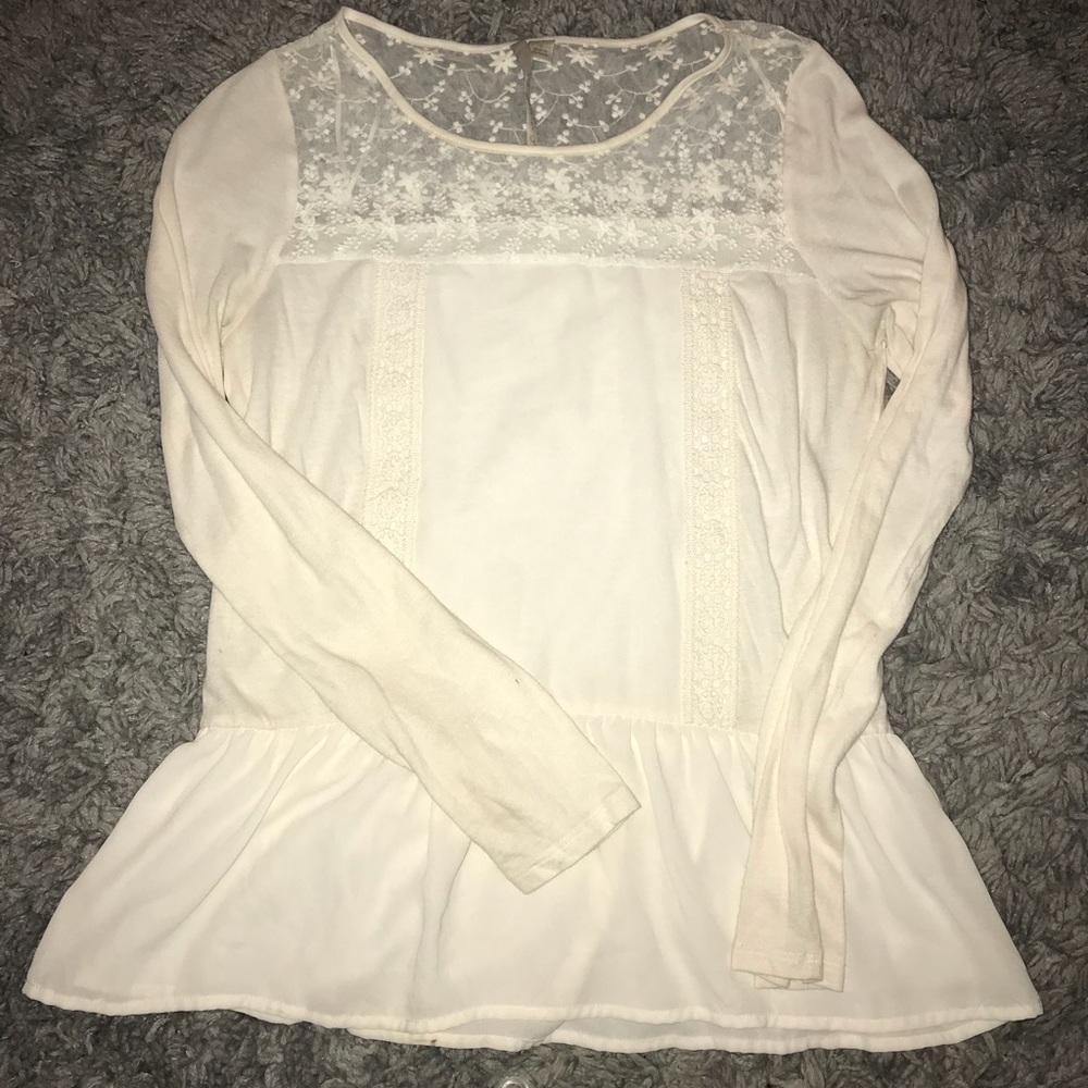 Cream colored peplum top