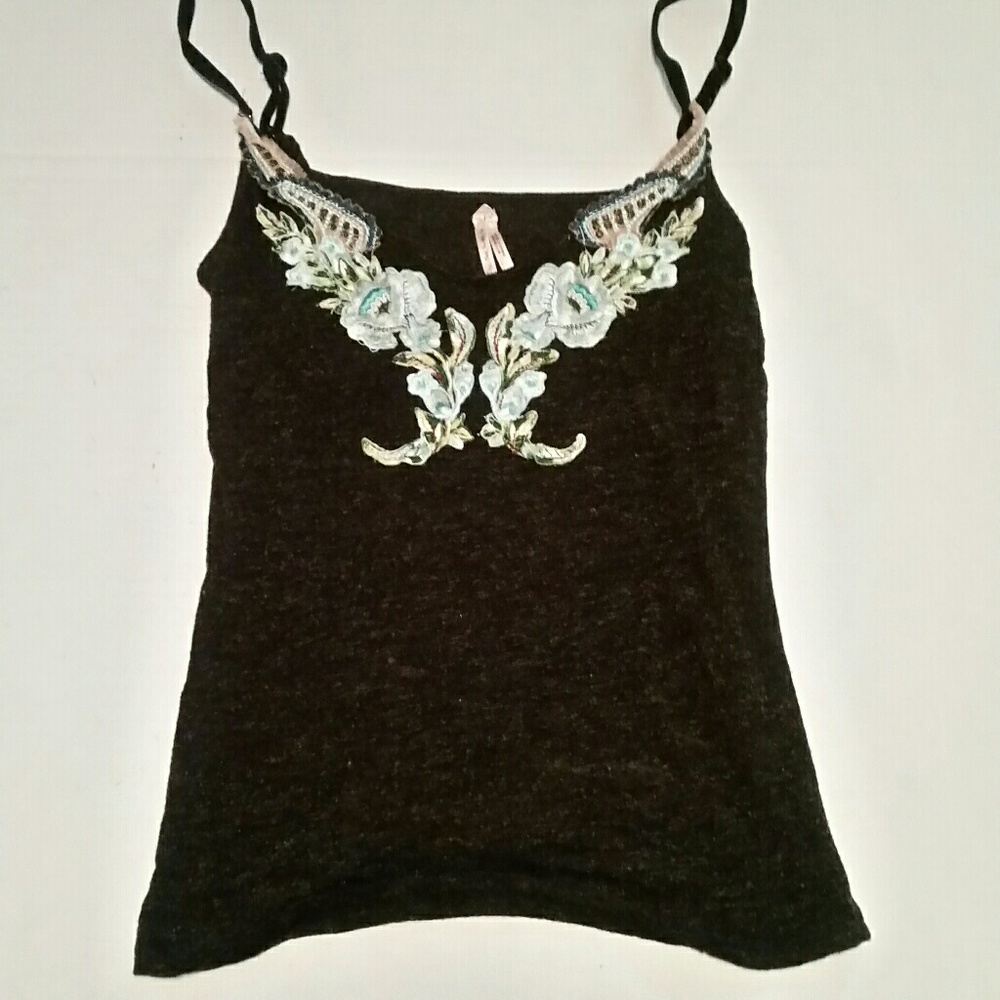Free People tank top size large. Great Design