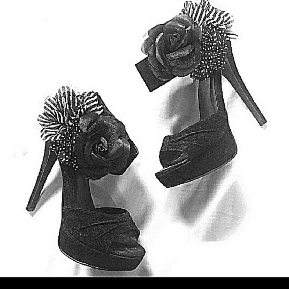 Black stiletto heel with strap