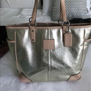Gold coach tote