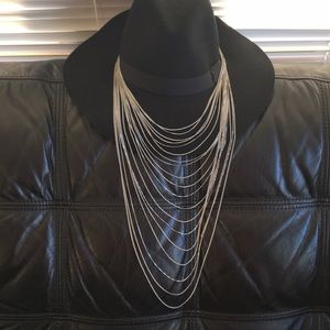 Dramatic extra long multi strand silver necklace