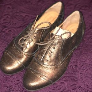 Clark’s indigo metallic shoes