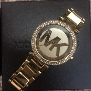 Michael Kors diamond and gold watch.