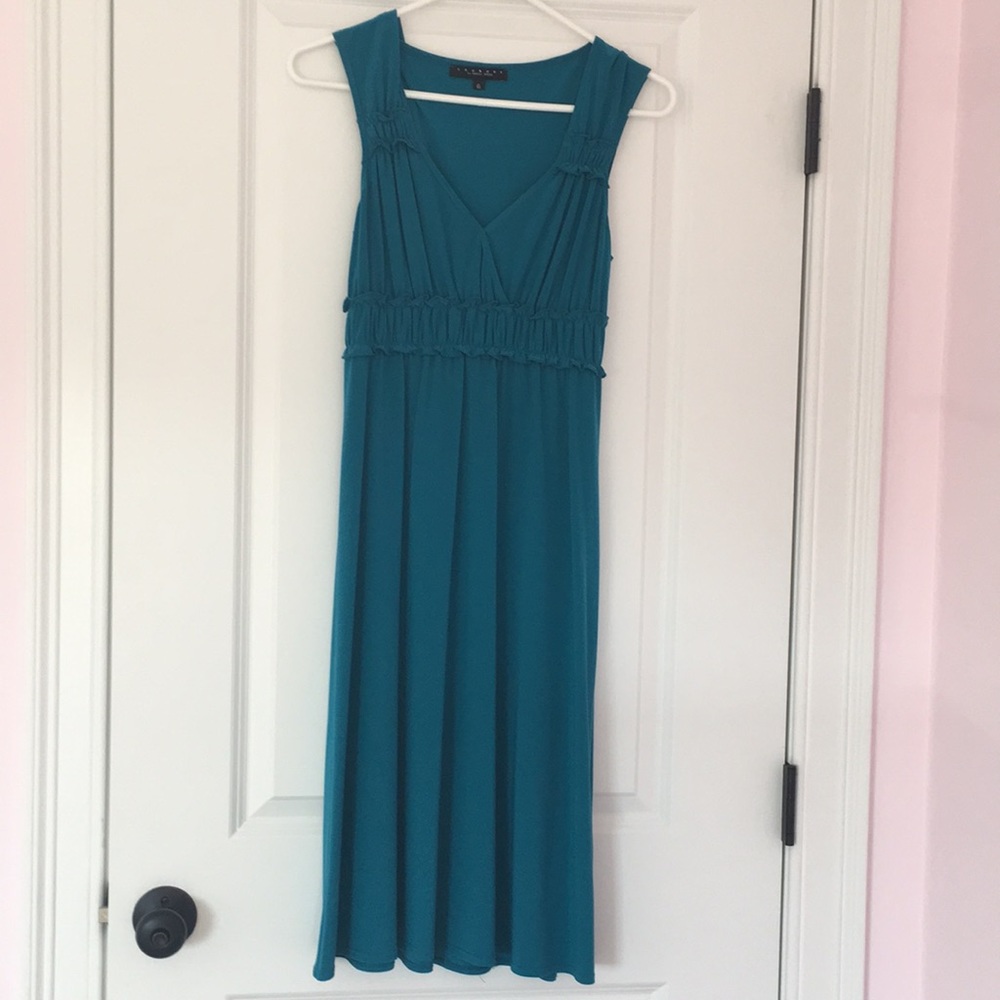 Dress perfect for a wedding, party. Worn twice!