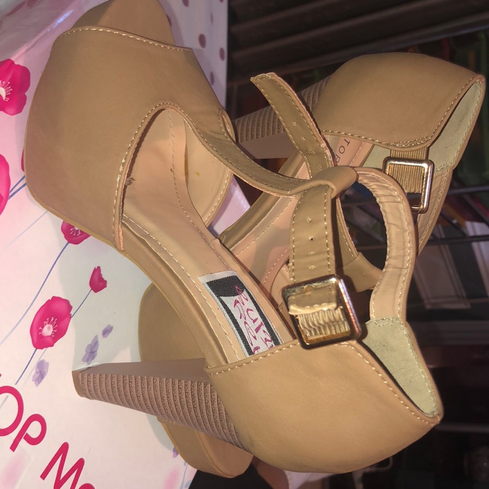 Cream suede pumps