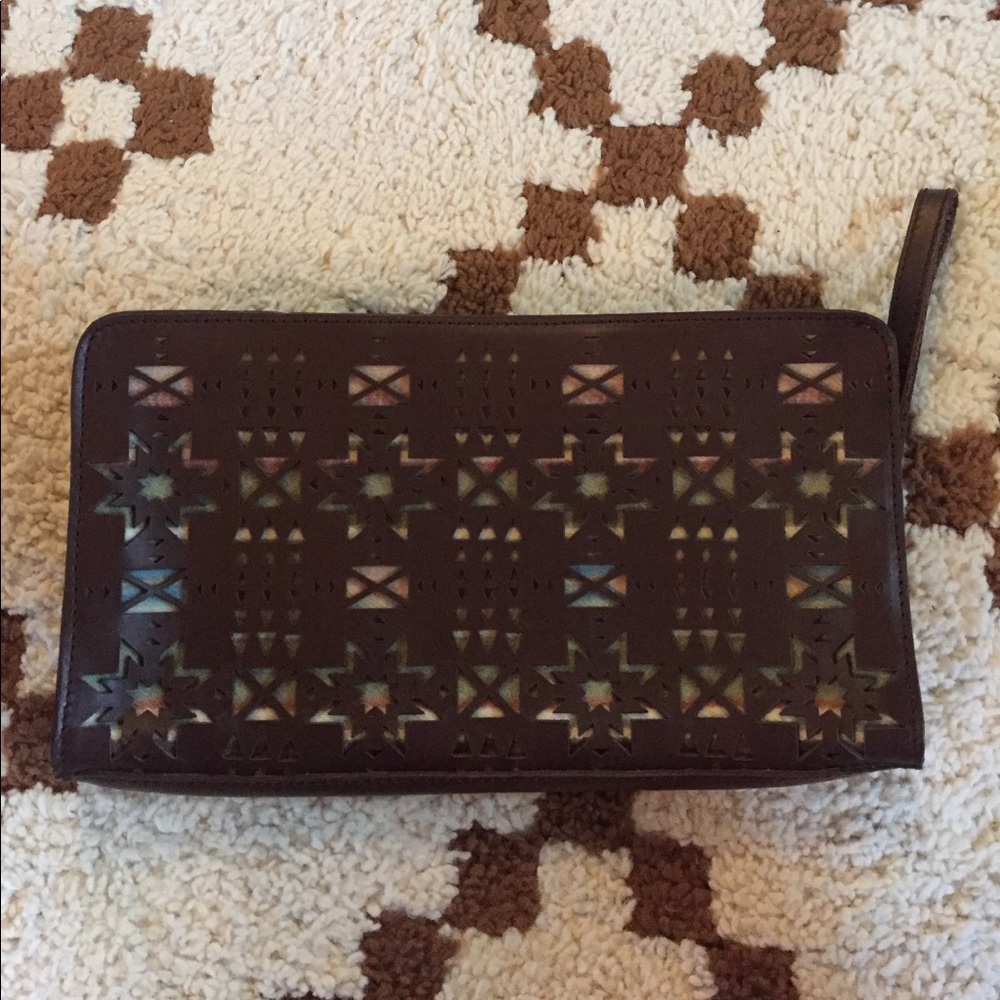 Laser cut Pendleton brown leather and wool clutch wristlet
