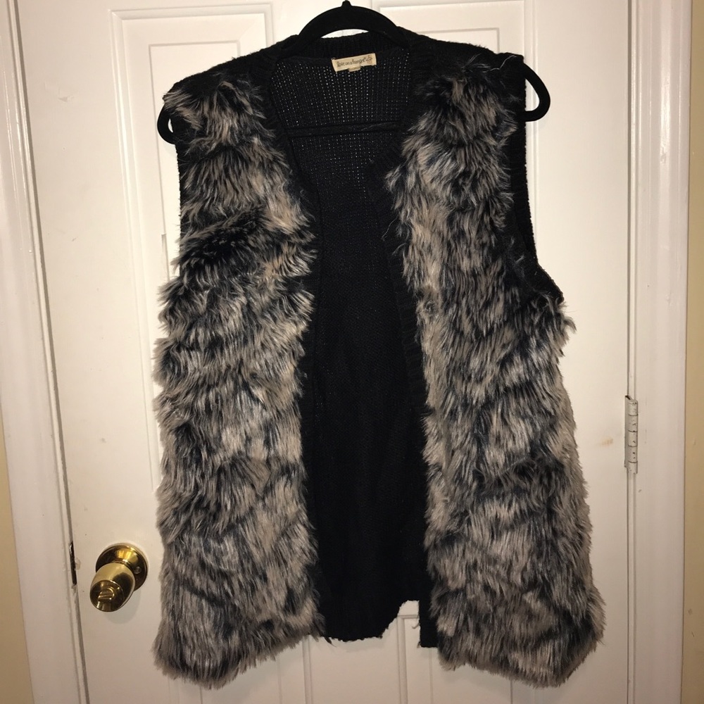 Black and grey fur vest