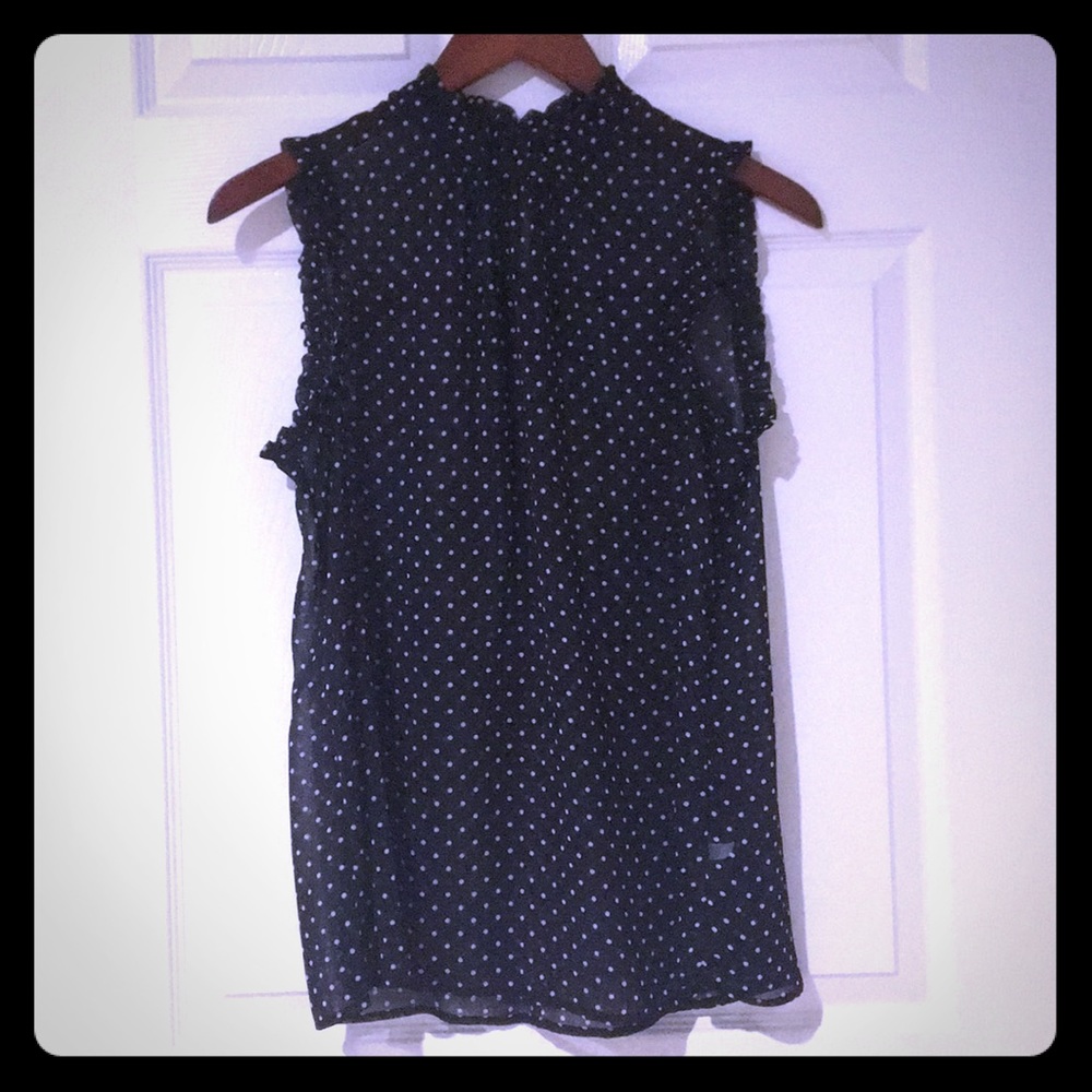 SOLD.......Black top with white polka dots NWOT
