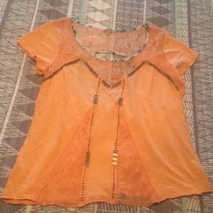 Orange shirt with lace and gold beaded detail