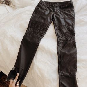 Dark plum vegan leather pants.