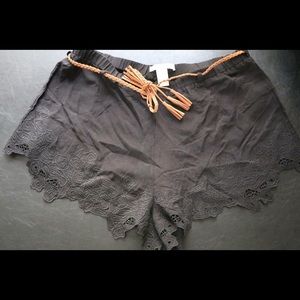 Black lace shorts with brown braided belt