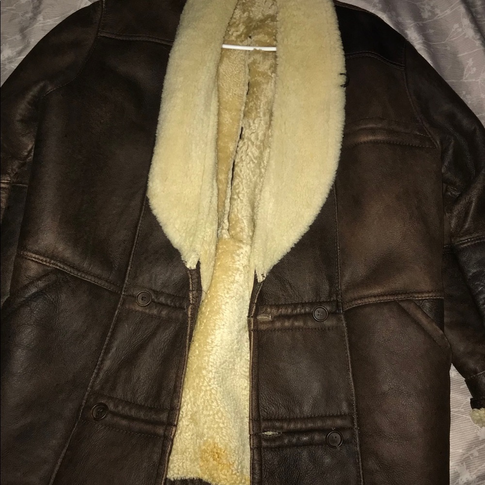 Sheep wool an leather coat. Great for winter.