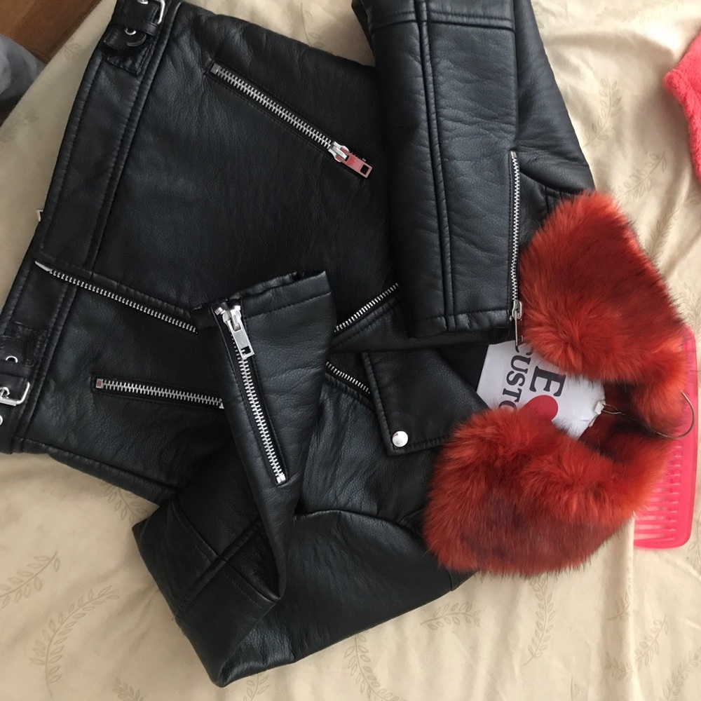 Real leather very heavy coat .