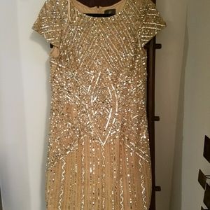 Nude beeded cap sleeve dress