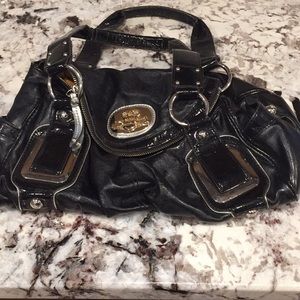 Kathy Van Zeeland black purse.