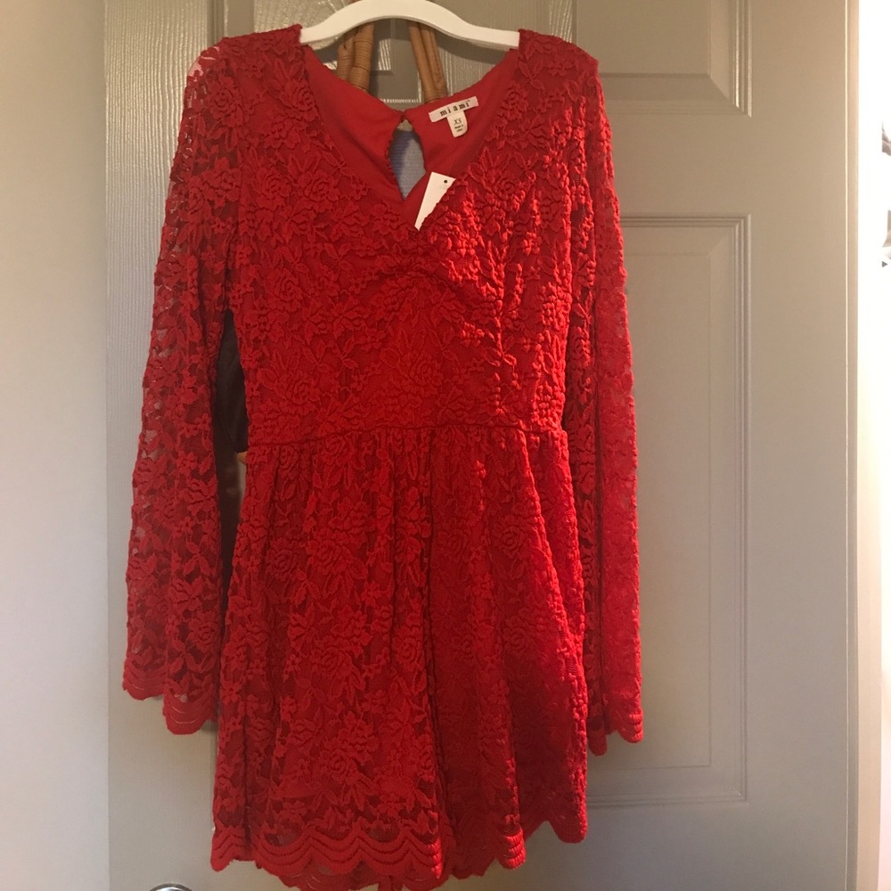 Red lace bell-sleeve romper