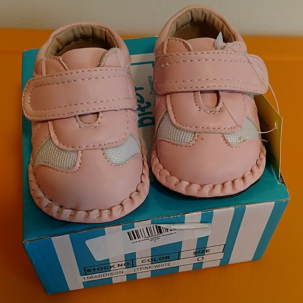 BRAND NEW Size 0 infant shoes.
