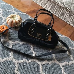 Beautiful coach material and leather bag