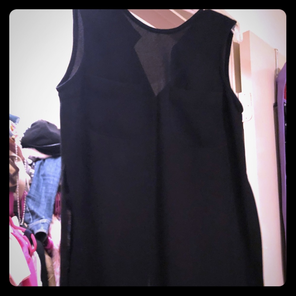 Lovely black blouse the buttons up in the back