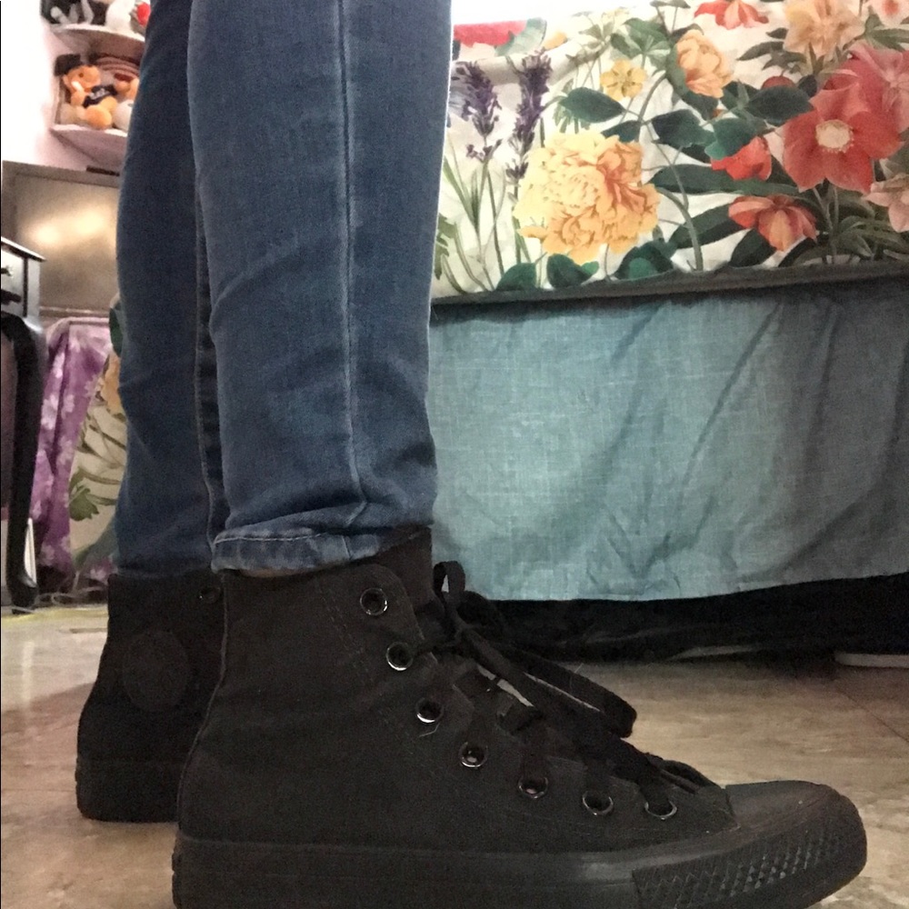 All black high top Converse