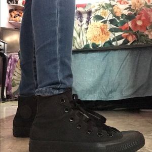 All black high top Converse