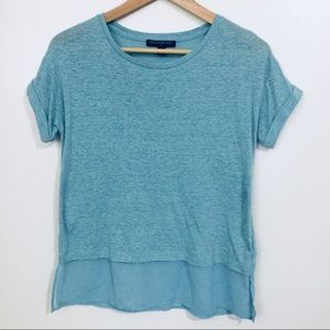 Blue short sleeve shirt.