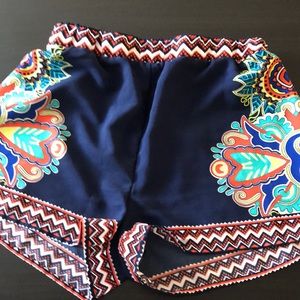 navy blue teal orange white and yellow shorts