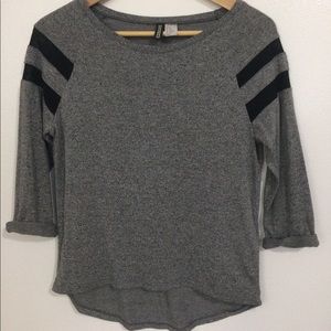 Grey and black ¾ sleeve tee.