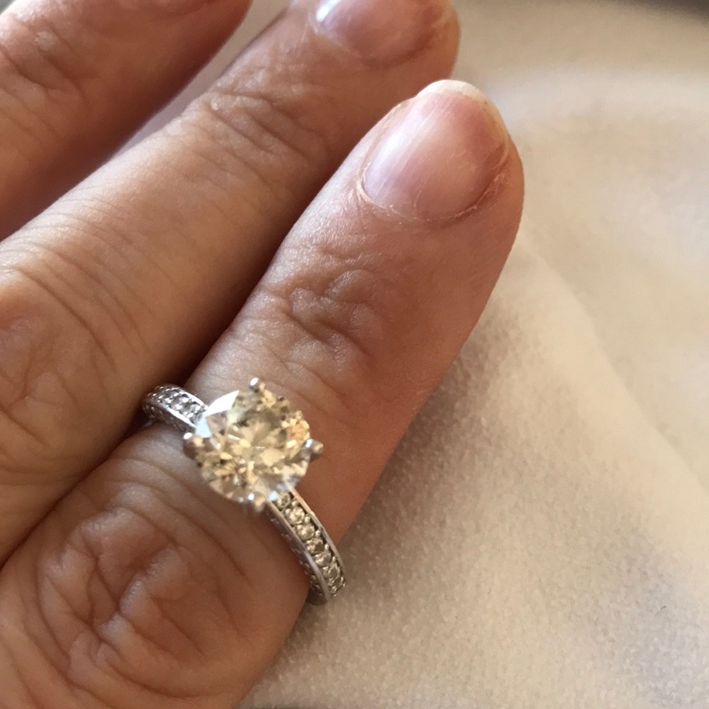 1.91 ct. center is K in color and I1. 44 round.