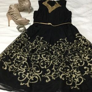 Sleeveless black and gold dress
