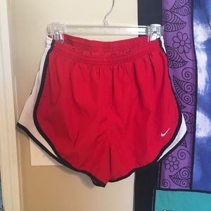 Red Nike shorts