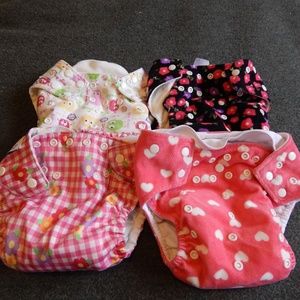 Lot of 4 used AIO cloth diapers plus 2 more!