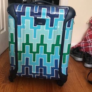 tumi hard suitcase