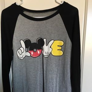 Long-sleeved graphic T-shirt.