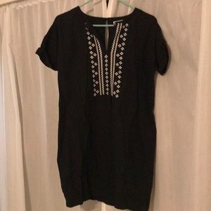 Black dress/tunic with embroidered detail.