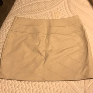 Tan leather mini skirt