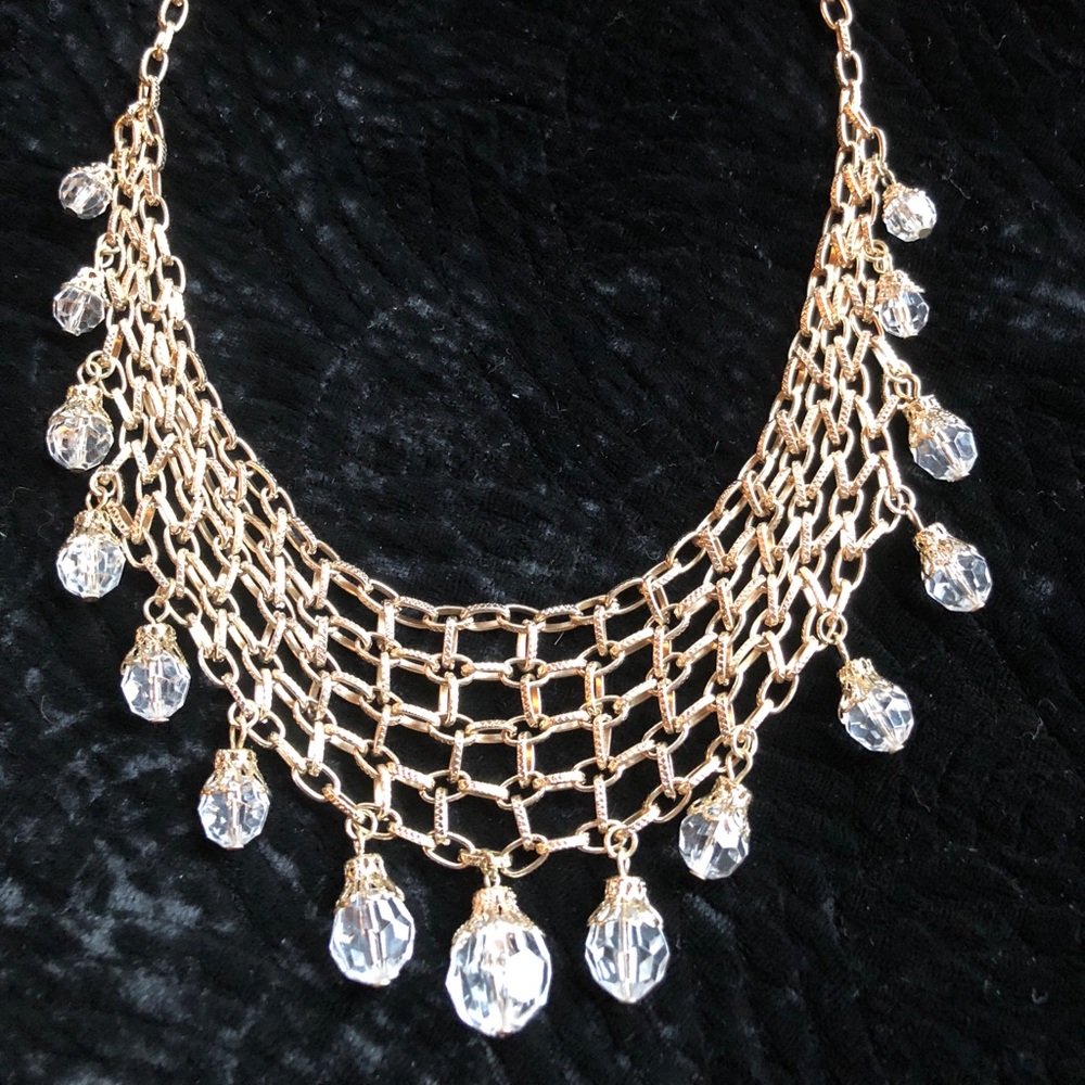 Costume jewelry fake gold and crystal.