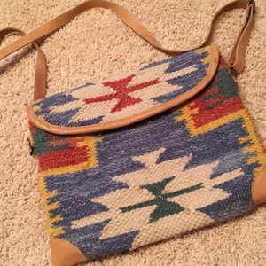 Rug purse with leather detail