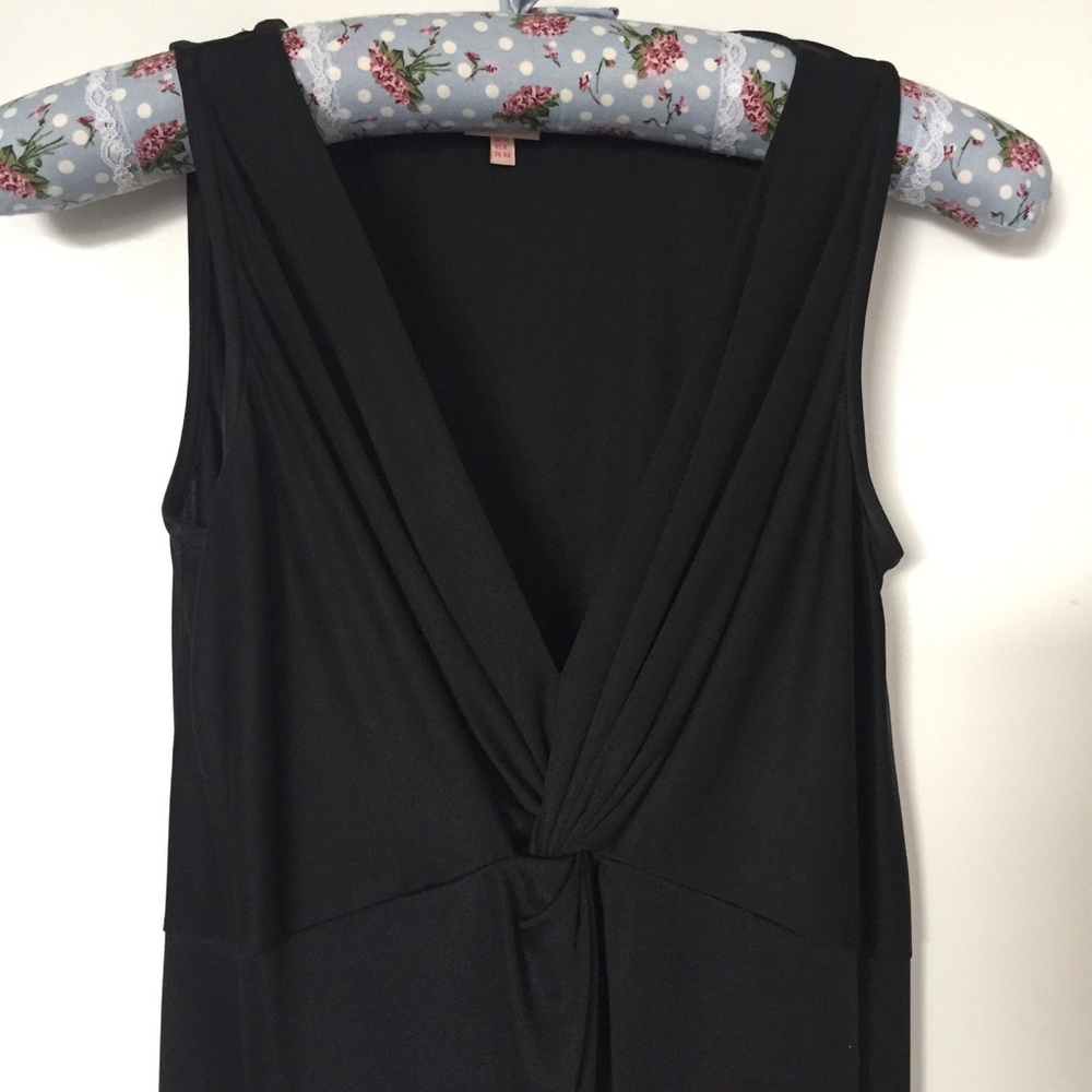 Black silk knee length dress.