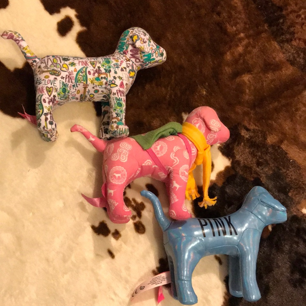 Three VS PINK dogs