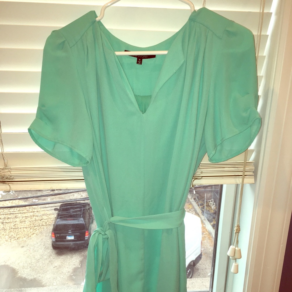 Turquoise tunic.