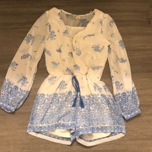blue and white print long sleeve romper