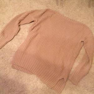 Great sweater with open tie back and side slits
