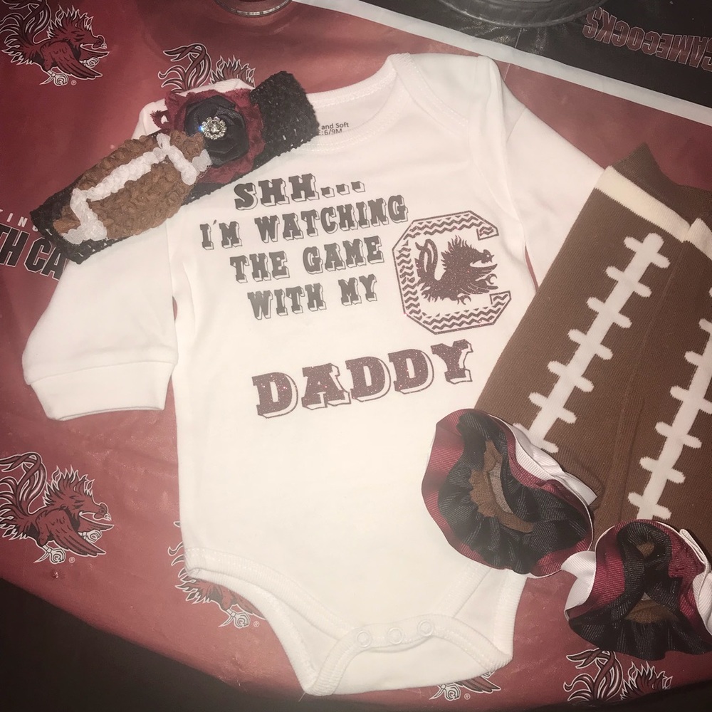 USC “Shhhh....I’m watching football with my Daddy”