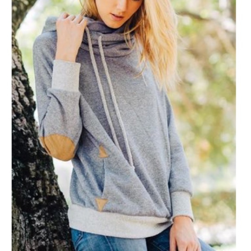 Cowl neck hoodie with suede patchwork. BOUTIQUE