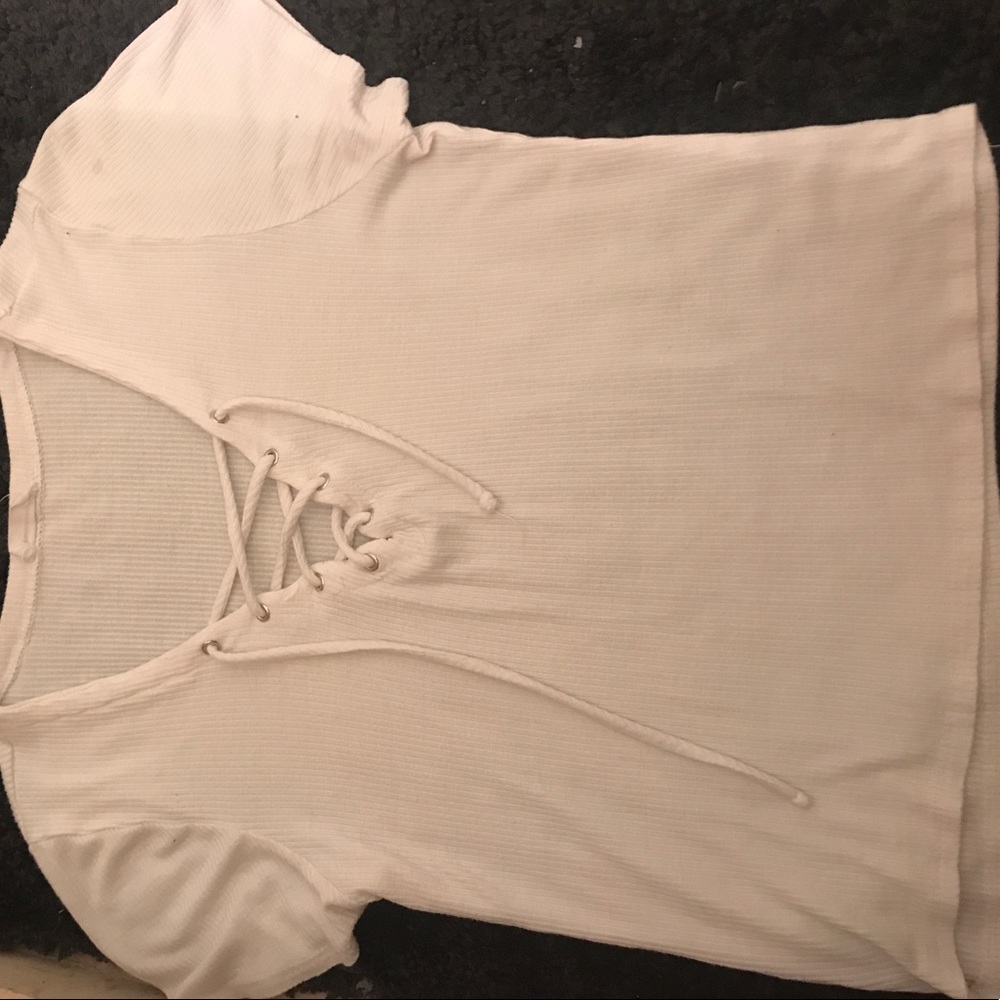 Simple white shirt/crop top with crossing center