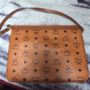 Authentic Mcm clutch .
